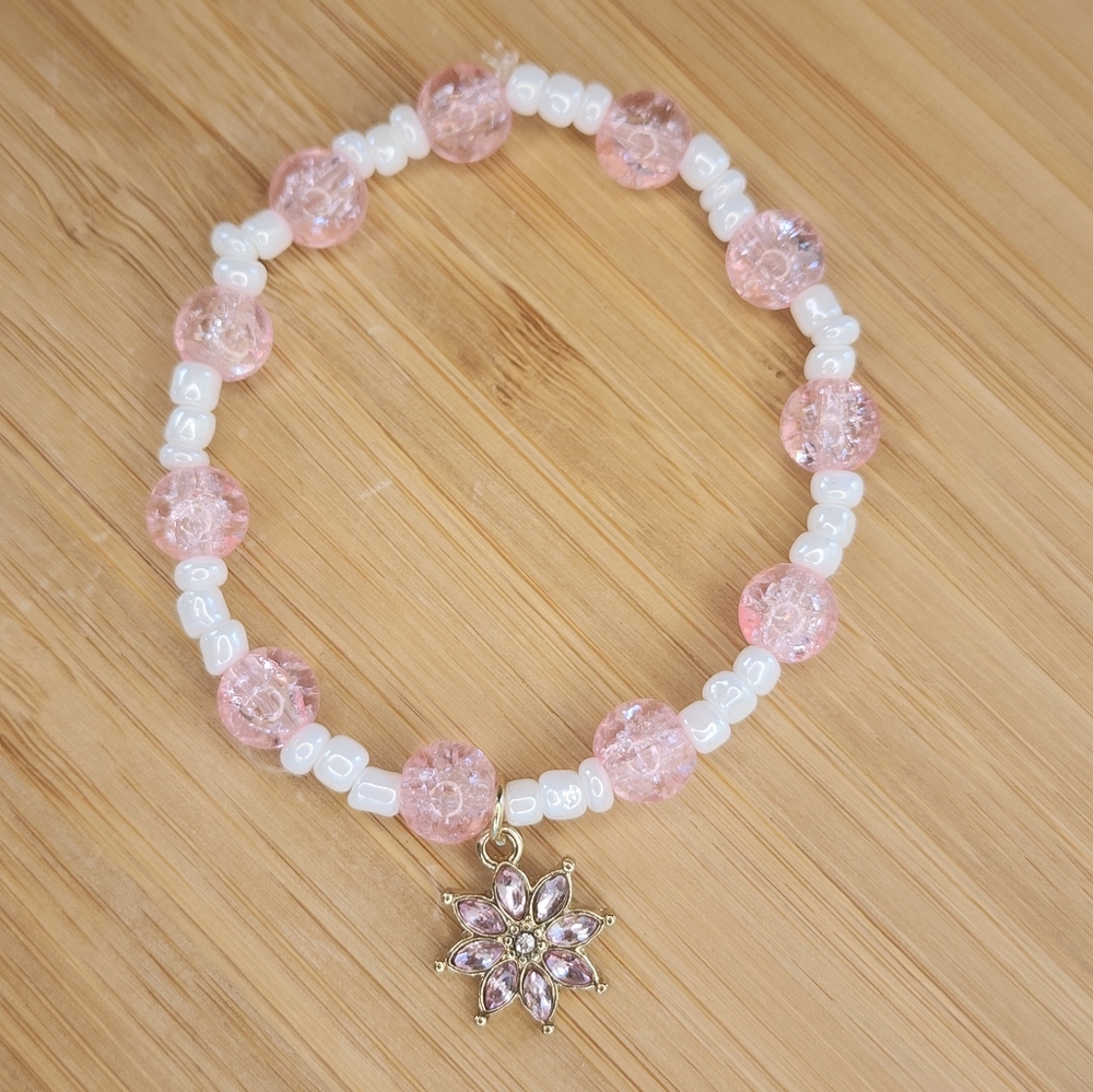Beaded glass bracelet, flower charm
